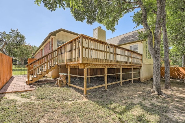 rear view of property with a deck