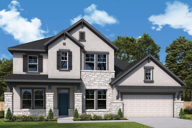 view of front of home featuring a garage and a front lawn