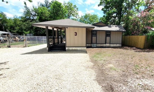 view of front facade with an outdoor structure