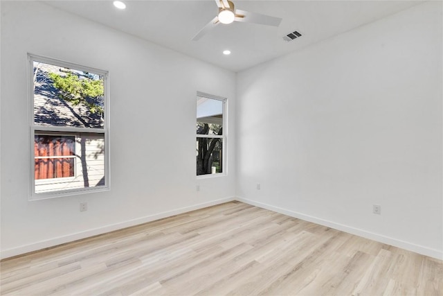 unfurnished room featuring ceiling fan and light hardwood / wood-style flooring