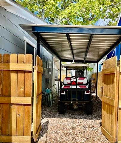 view of parking with a carport