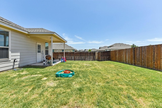 view of yard with a patio area