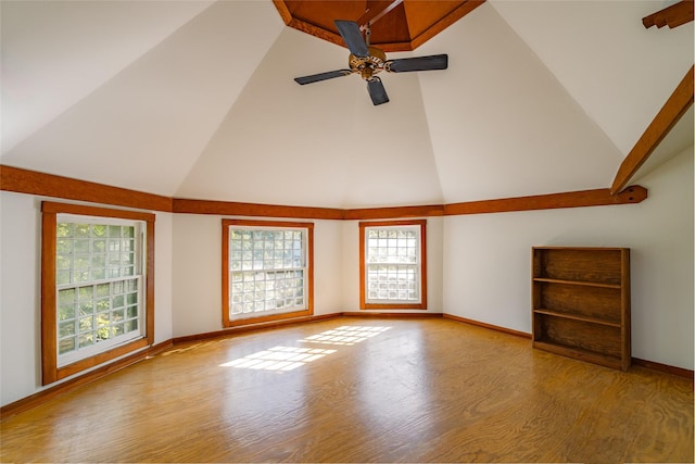 interior space with ceiling fan, high vaulted ceiling, and light hardwood / wood-style flooring