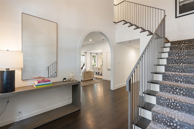 interior space with dark hardwood / wood-style flooring