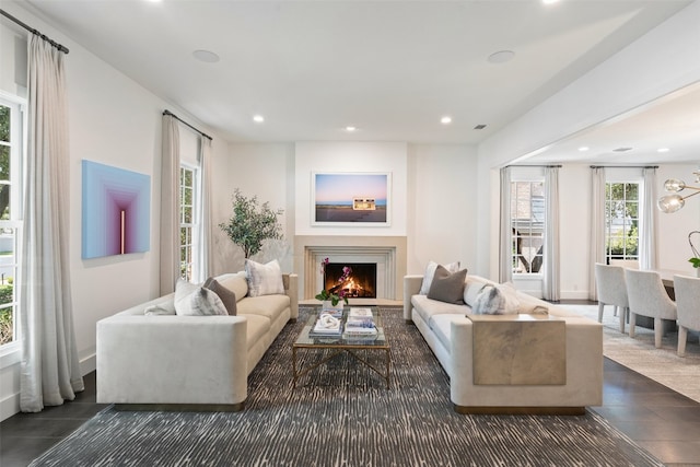 living room featuring dark tile patterned flooring