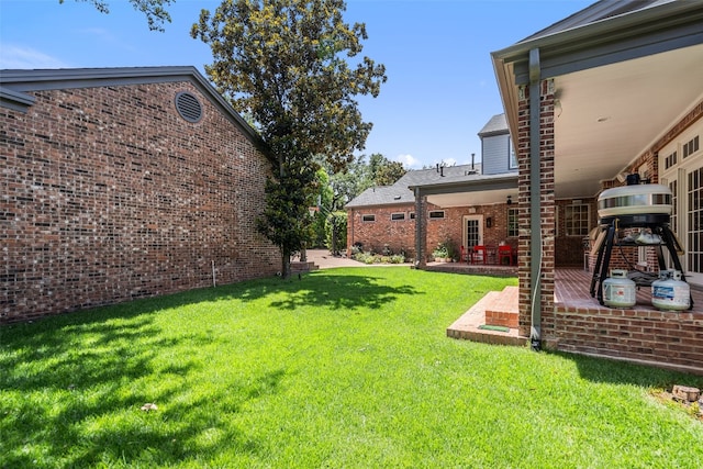 view of yard featuring a patio area