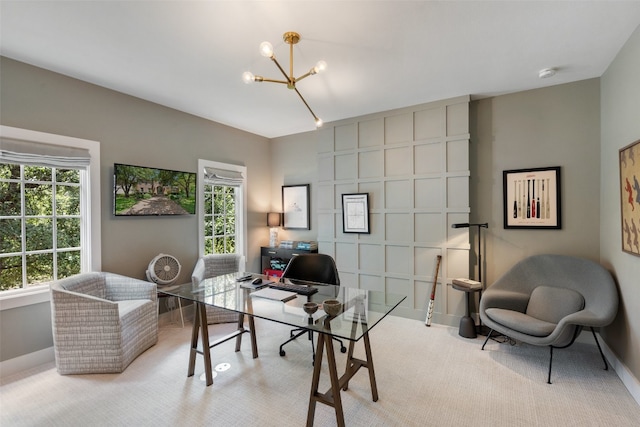 home office featuring a notable chandelier and light colored carpet