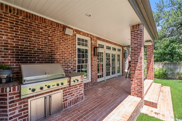 view of patio / terrace featuring area for grilling and french doors