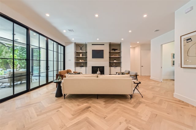 living room featuring light parquet flooring