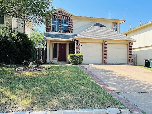 front of property with a front lawn and a garage