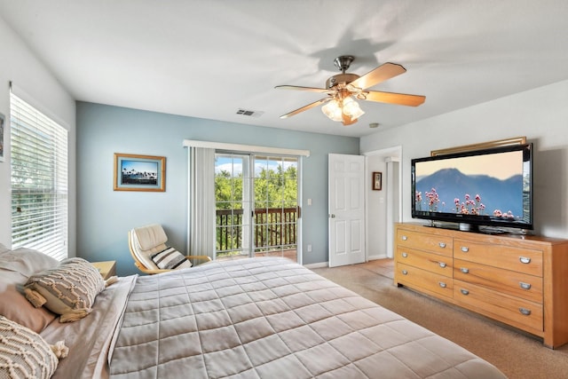 carpeted bedroom featuring ceiling fan and access to outside