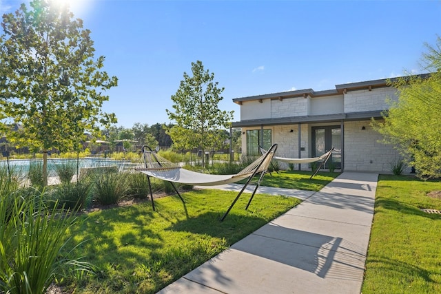 exterior space with a front yard