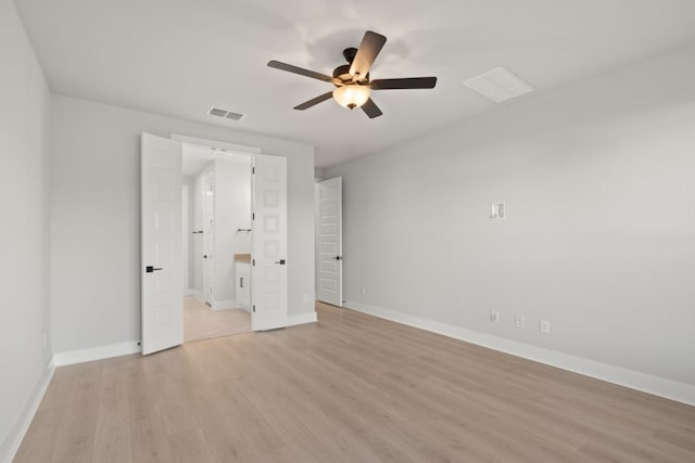 unfurnished bedroom with light hardwood / wood-style flooring and ceiling fan