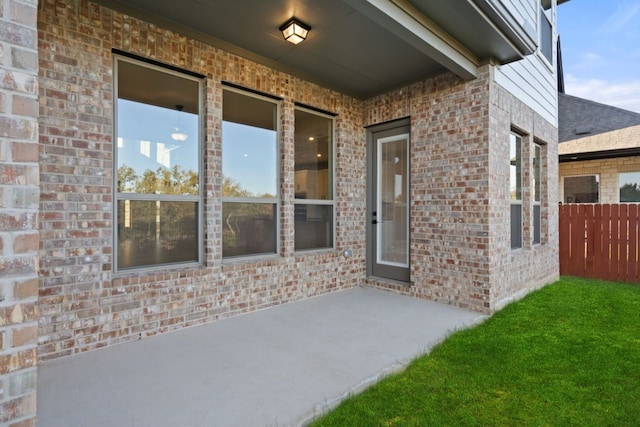 property entrance with a patio