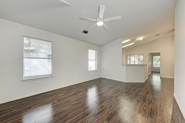 unfurnished room with ceiling fan, dark hardwood / wood-style flooring, and lofted ceiling