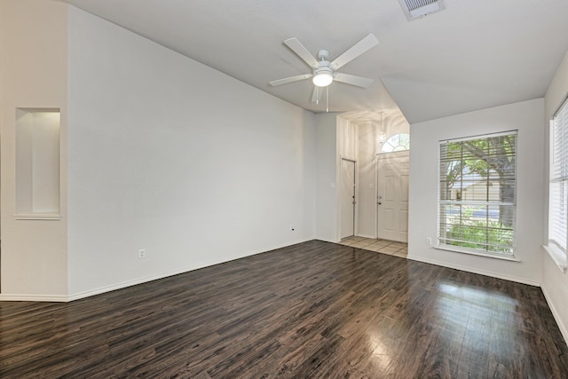 spare room with hardwood / wood-style flooring and ceiling fan