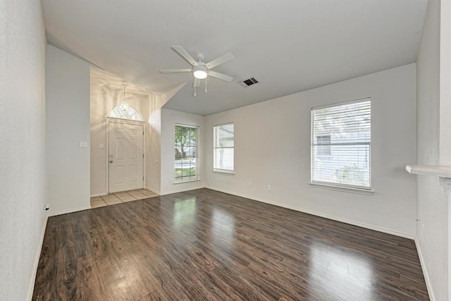 interior space featuring ceiling fan and wood-type flooring