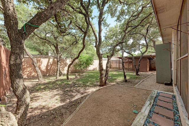 view of yard with a shed