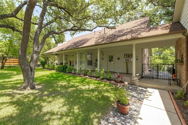 view of front facade with a porch and a front yard