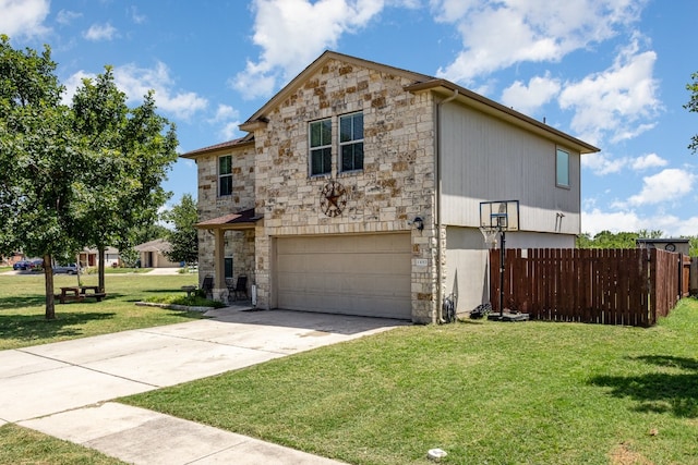 view of front facade featuring a garage and a front lawn