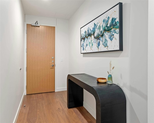 44 E Ave Unit 1507, Austin, TX 78701 - foyer entrance with light wood-type flooring and baseboards