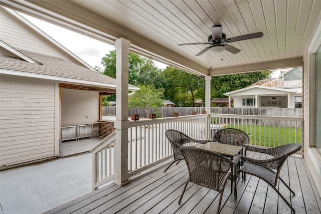 wooden deck with ceiling fan