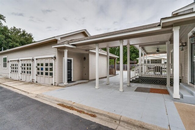 view of front of property with covered porch and ceiling fan