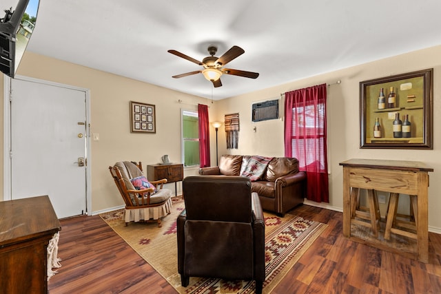 living room with ceiling fan, dark hardwood / wood-style floors, and a wall unit AC