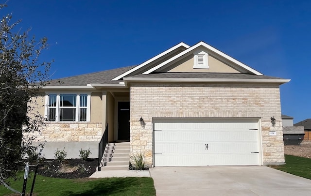 single story home with a garage