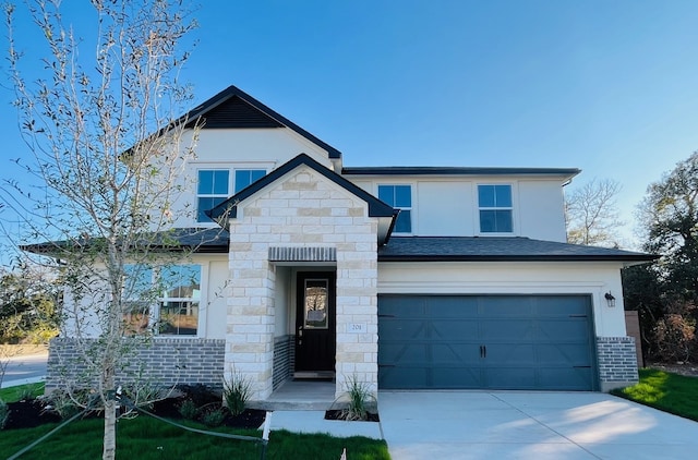 view of front of home featuring a garage