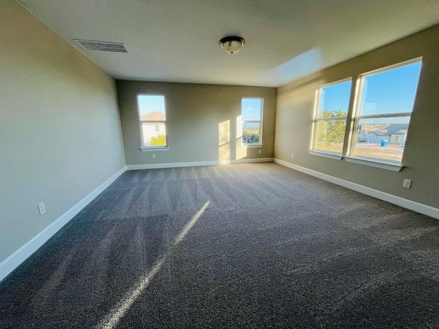 spare room featuring carpet flooring