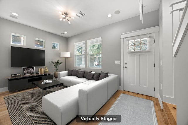 living room featuring light wood-type flooring