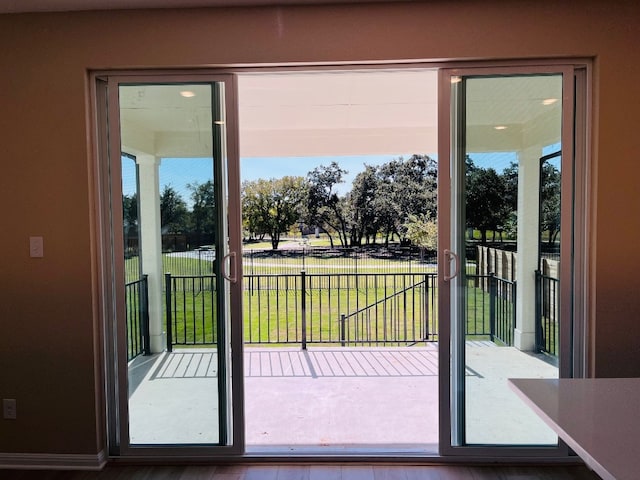 doorway to outside featuring hardwood / wood-style floors