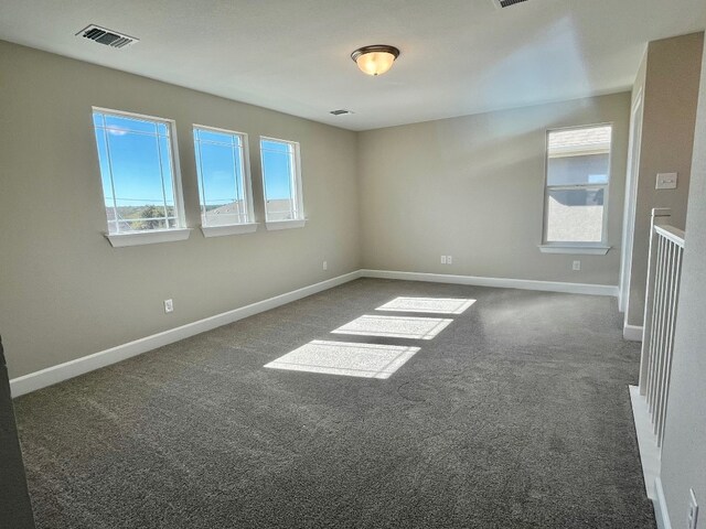 524 Raleigh Dr, Georgetown, TX 78633 - carpeted spare room featuring healthy amount of natural light and baseboards