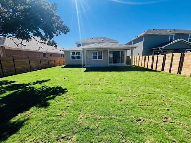 524 Raleigh Dr, Georgetown, TX 78633 - back of property with a patio area