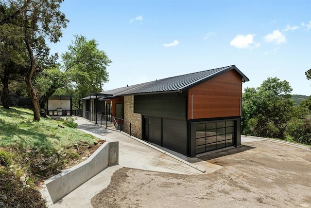 view of property exterior featuring an outbuilding