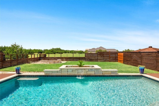 view of swimming pool featuring pool water feature and a lawn