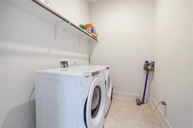 laundry room with washer and dryer