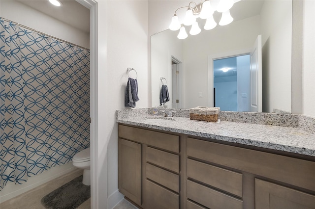 full bathroom featuring tile patterned flooring, toilet, shower / bath combo with shower curtain, vanity, and an inviting chandelier