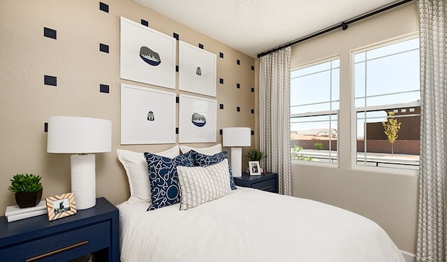 bedroom featuring a textured ceiling