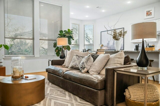 living room featuring a wealth of natural light