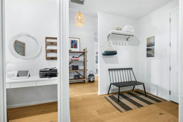 hall featuring wood-type flooring