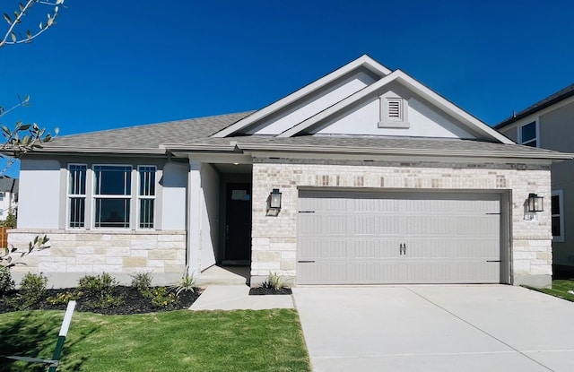 ranch-style house featuring a front yard and a garage