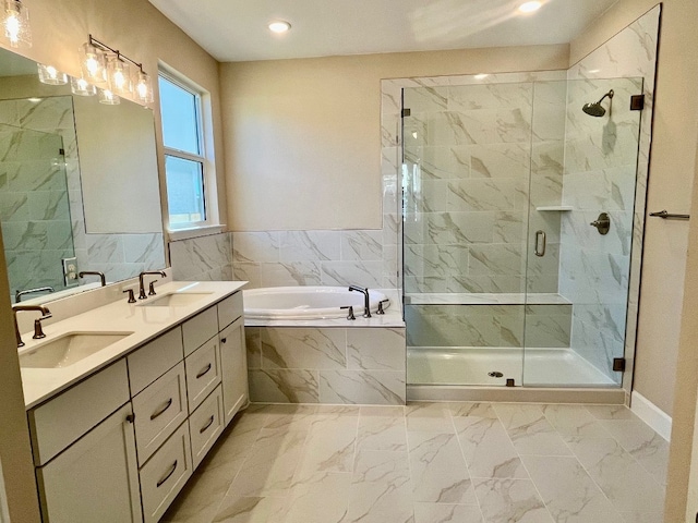 544 Raleigh Dr, Georgetown, TX 78633 - full bathroom featuring a garden tub, a marble finish shower, marble look tile flooring, double vanity, and recessed lighting