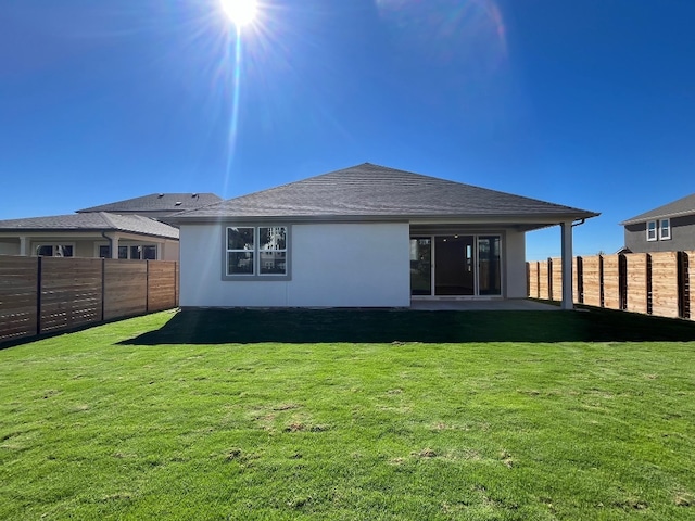 544 Raleigh Dr, Georgetown, TX 78633 - rear view of property featuring stucco siding and roof with shingles