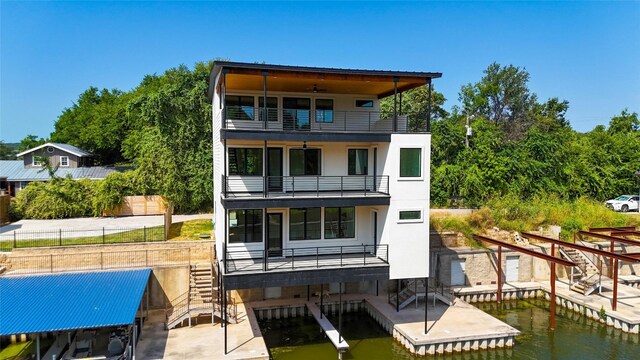 back of house with a balcony