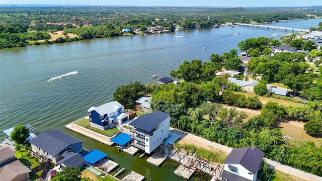 drone / aerial view with a water view