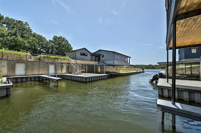 dock area with a water view