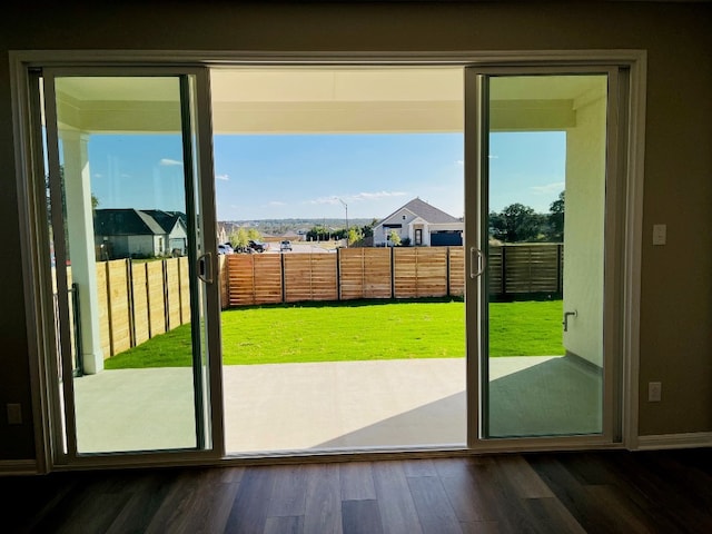 doorway to outside featuring hardwood / wood-style flooring