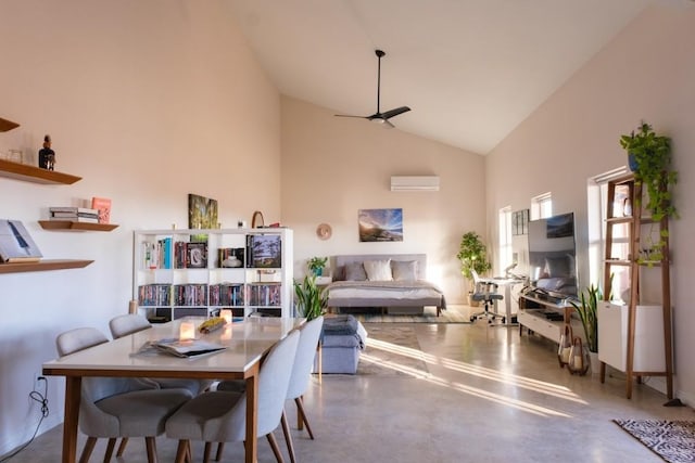 dining area with a wall mounted air conditioner, concrete floors, high vaulted ceiling, and ceiling fan